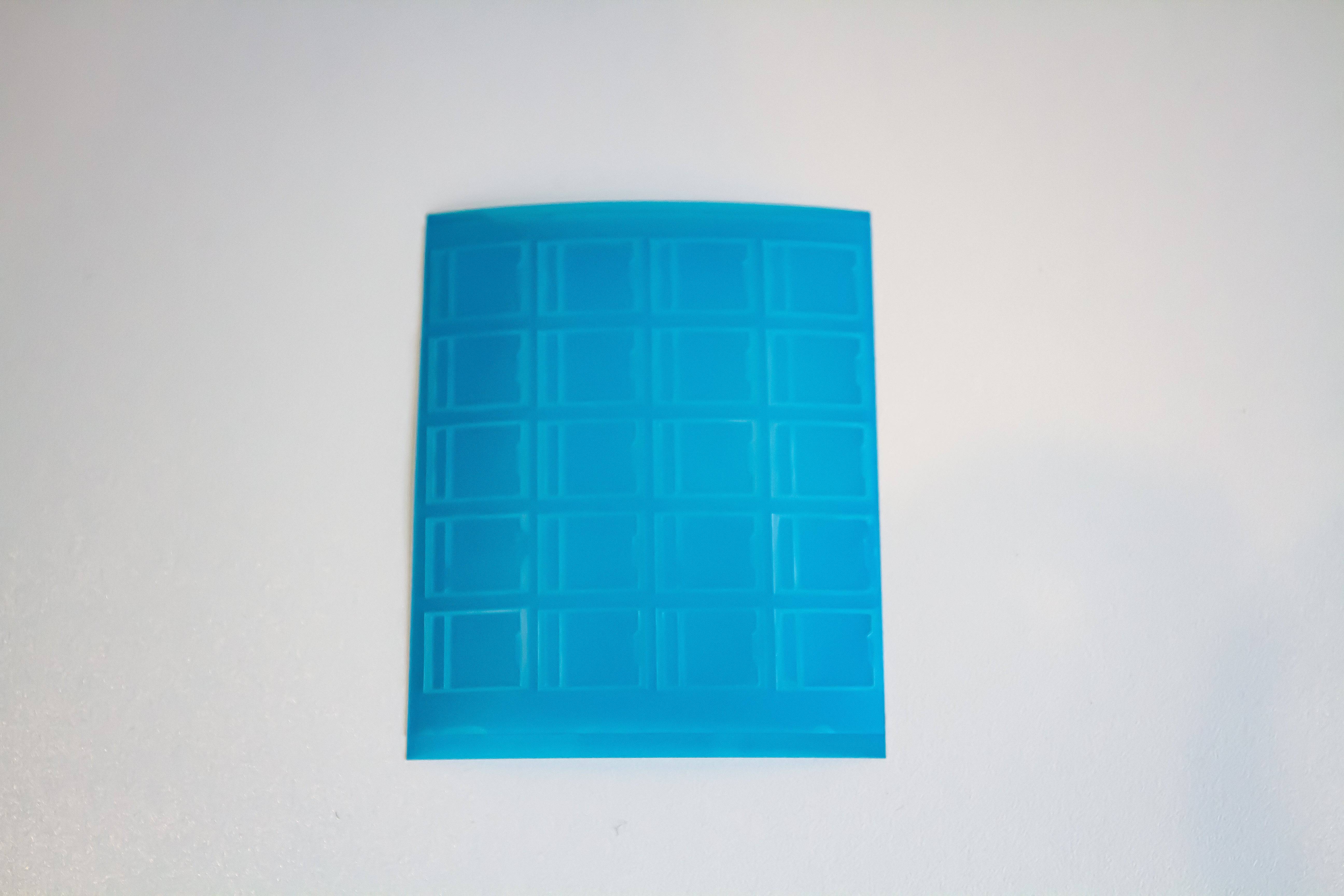 A single sheet of Durock Mechanical key switch films with HTV and Polycarbonate material.