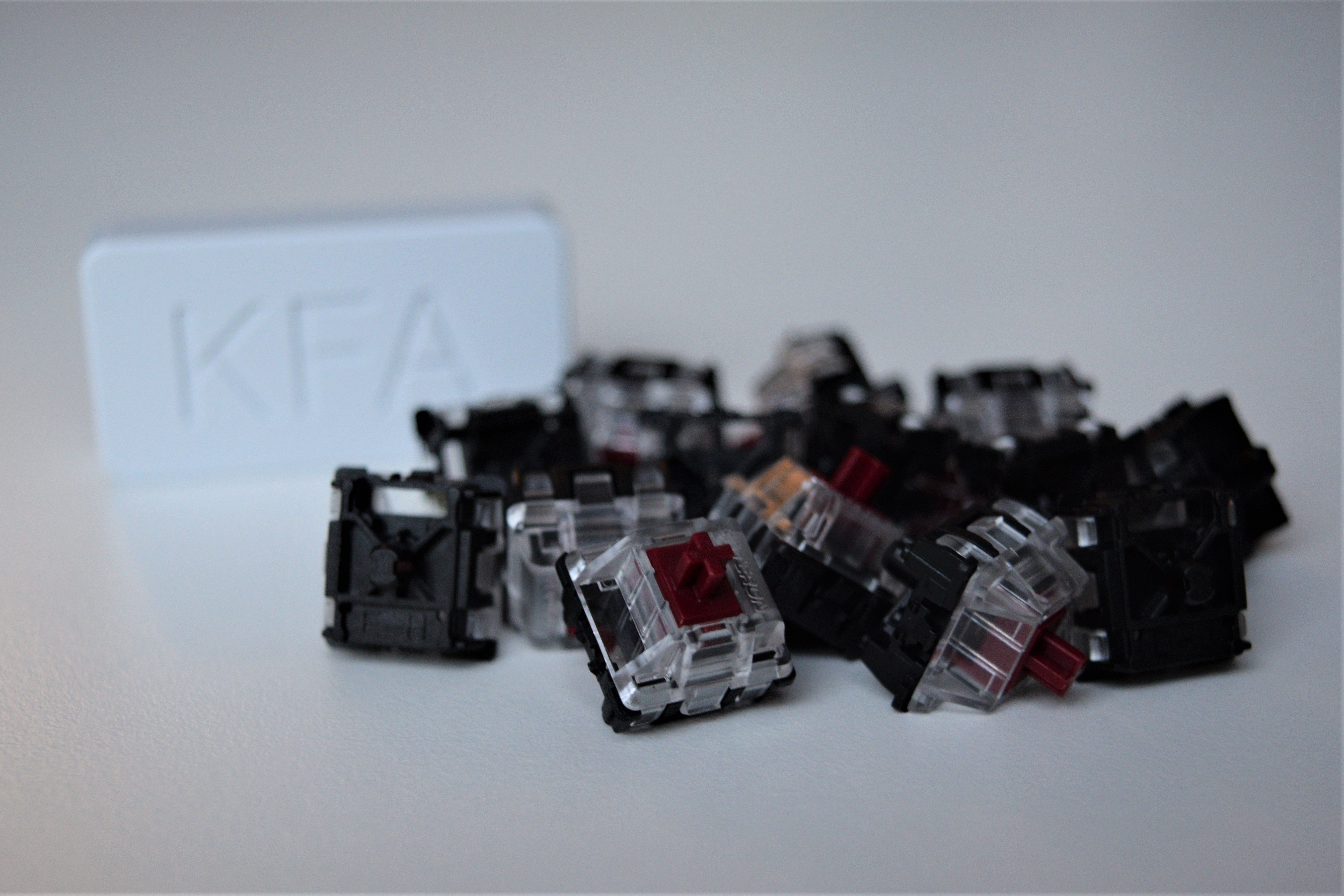 Gateron Optical Red Group View with KFA branding out of focus