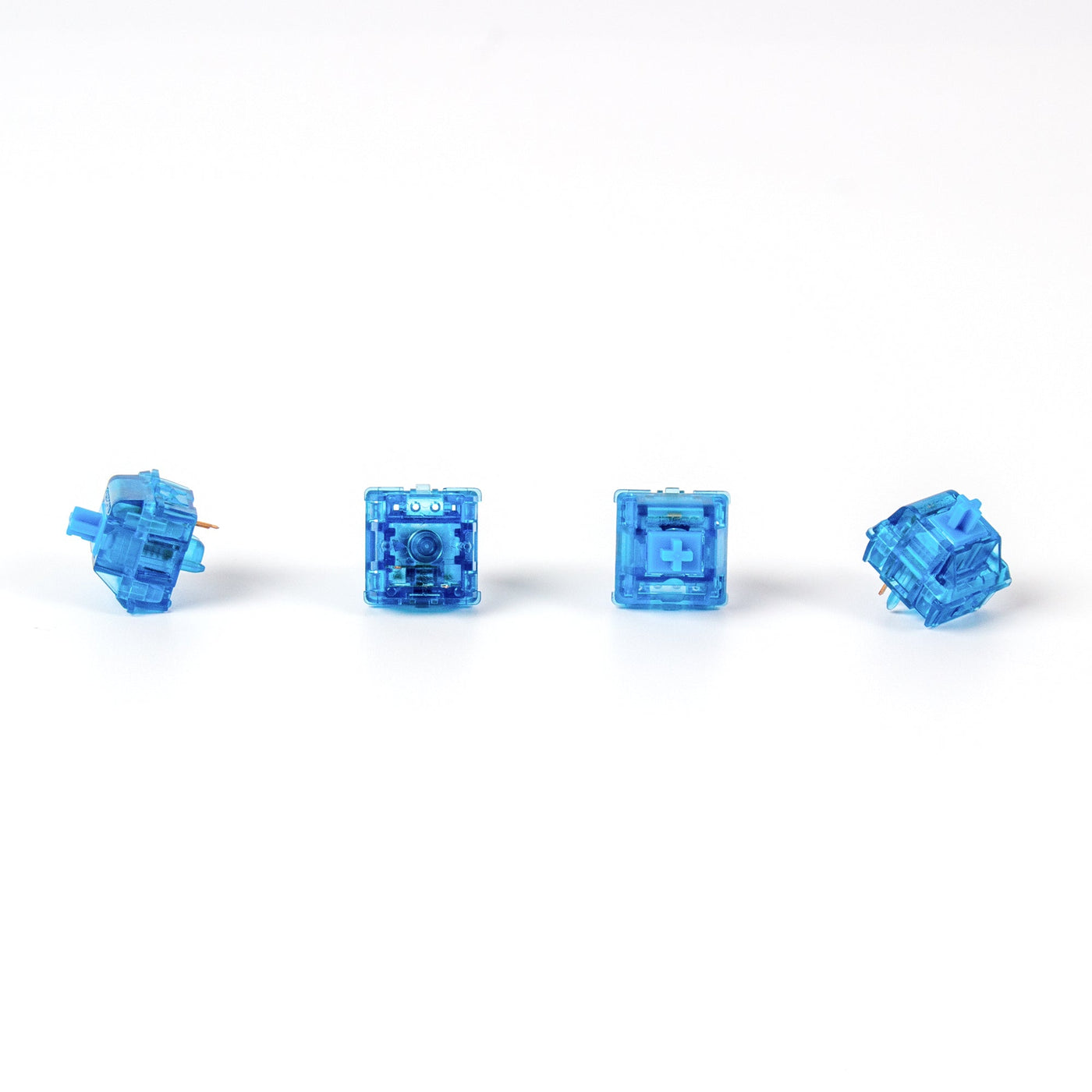 Close-up of Gateron Blue Ink V2 5-pin clicky mechanical keyboard switches with blue transparent housing