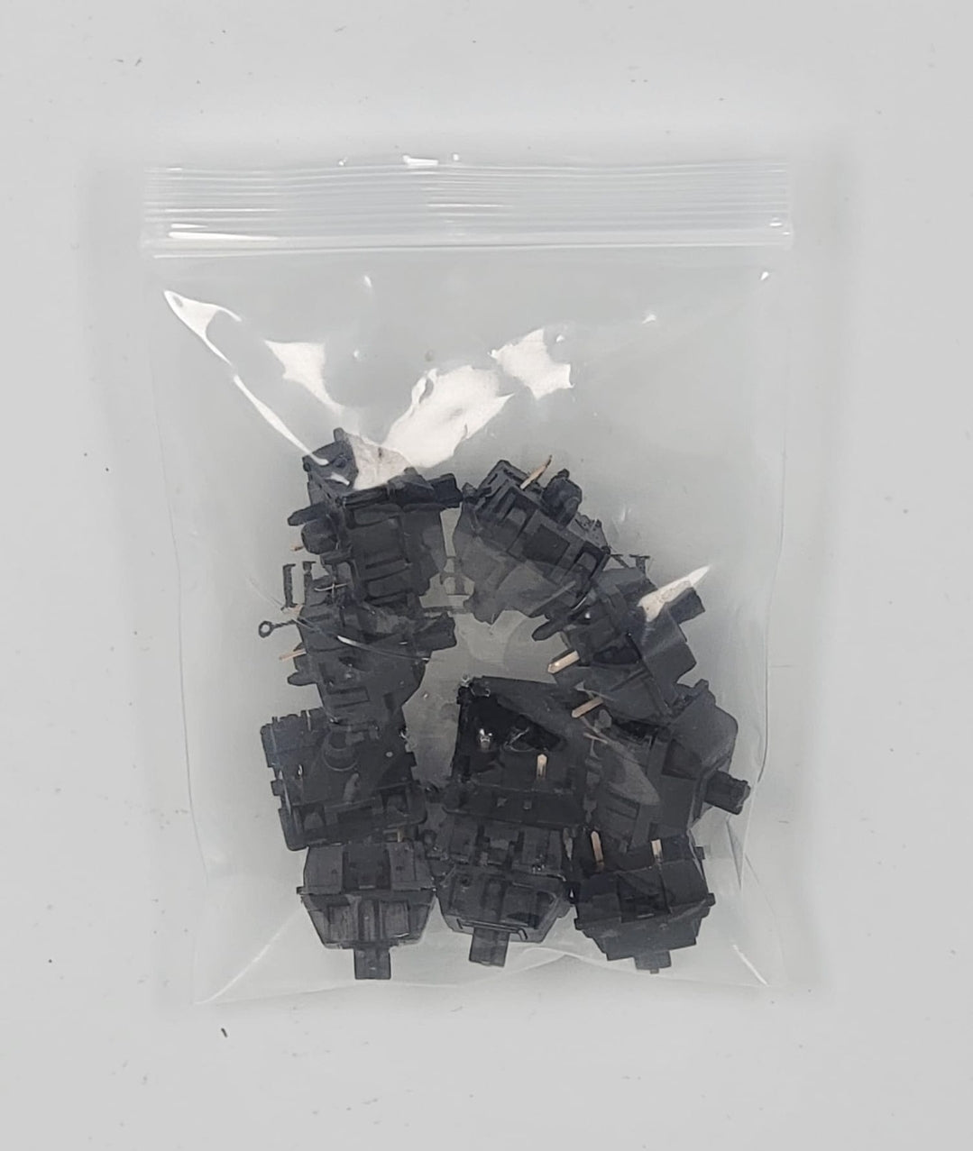 Jwick blacks 10 switches in a bag.