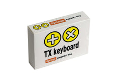 TX Spring Lube Deck featuring a precision-designed deck, 2-3ml bottle of paraffin synthetic oil, protective covers, and a durable storage box, displayed on a neutral backdrop.