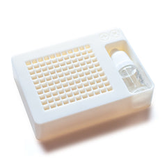 TX Spring Lube Deck featuring a precision-designed deck, 2-3ml bottle of paraffin synthetic oil, protective covers, and a durable storage box, displayed on a neutral backdrop.