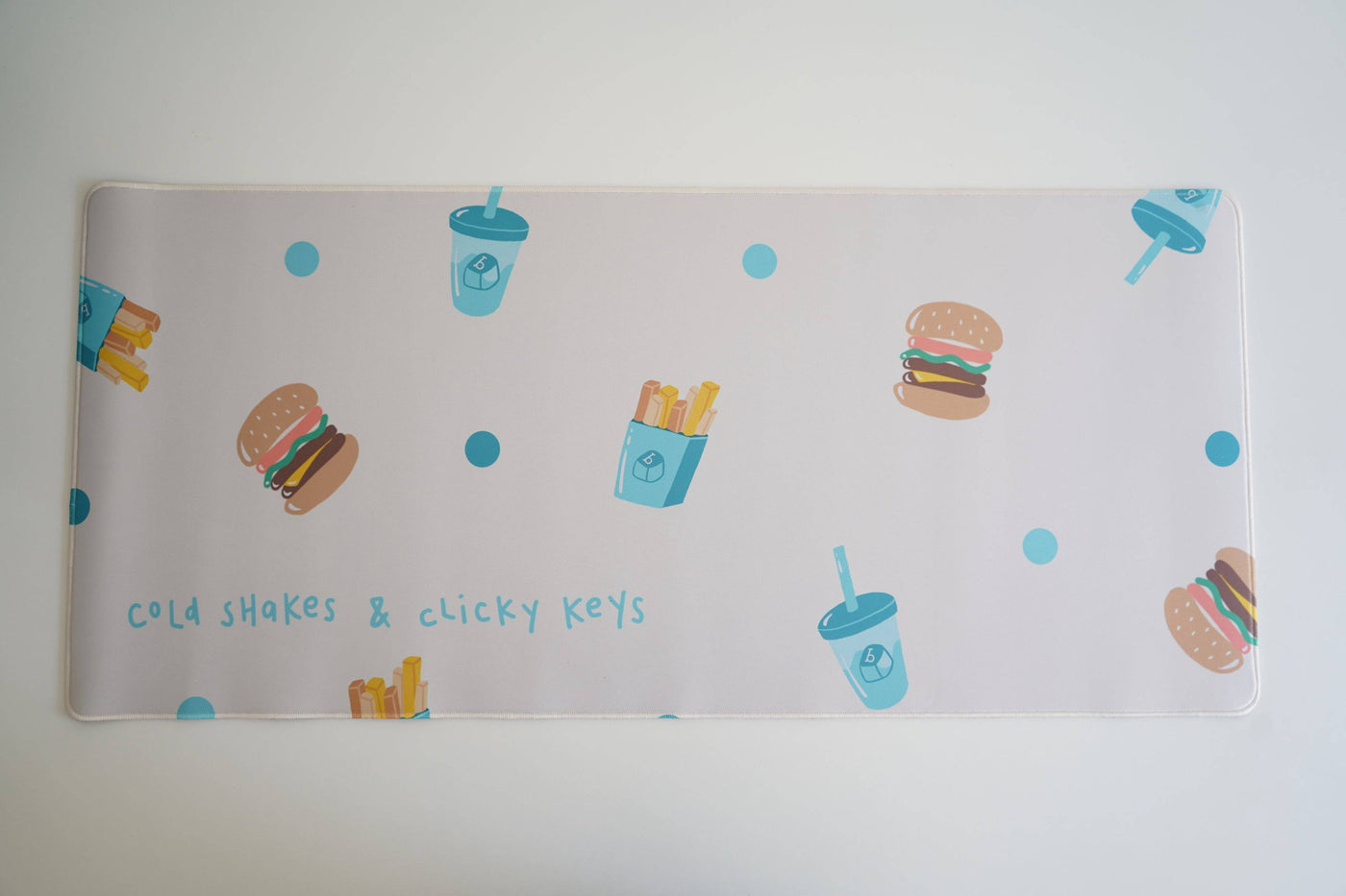 Close up of Cold Shakes & Clicky Keys Deskmats