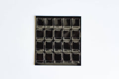 A single sheet of Deskeys mechanical keyboard switch films.