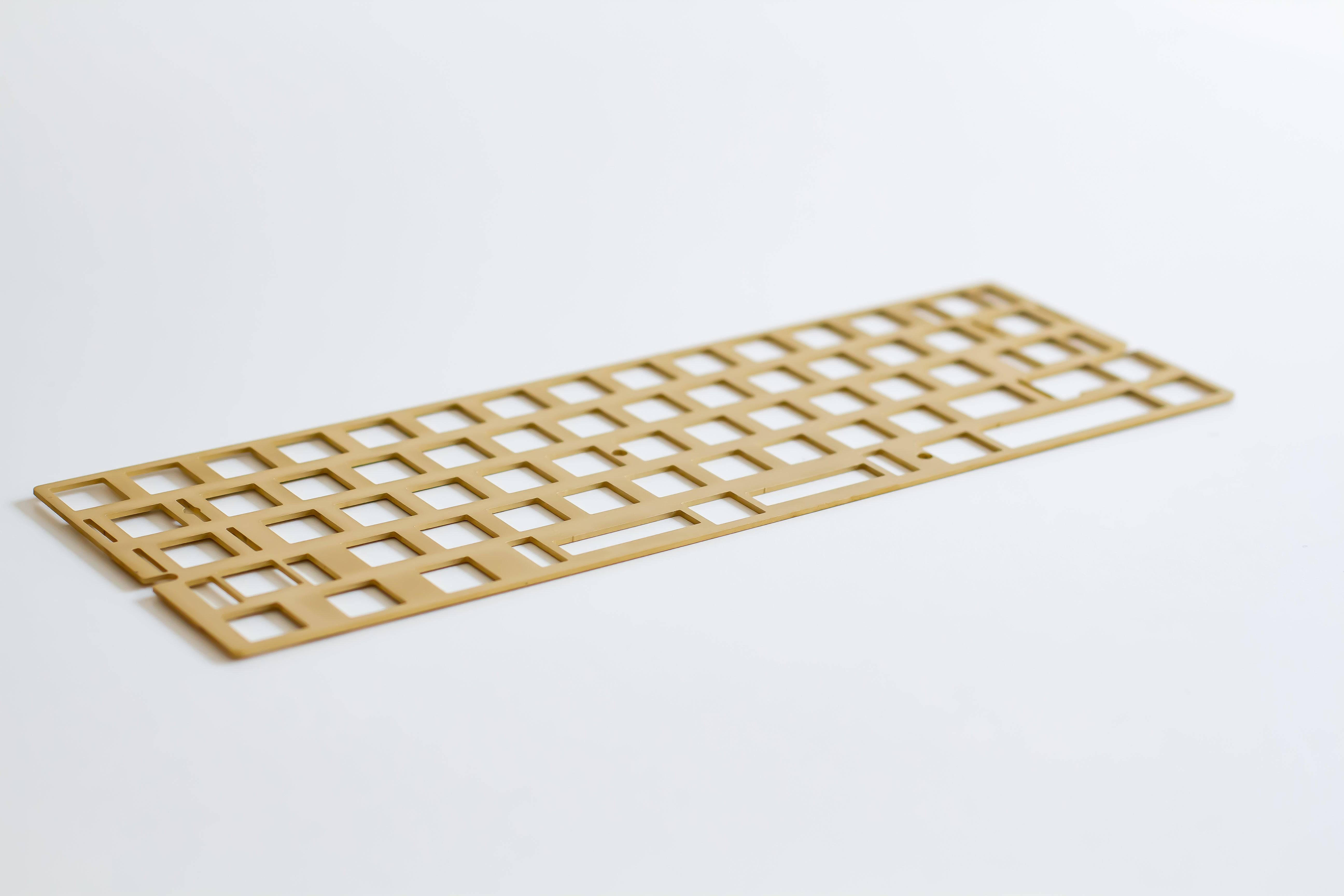 Side top down view of the FB60/Freebird60 universal ANSI brass mechanical keyboard plate.