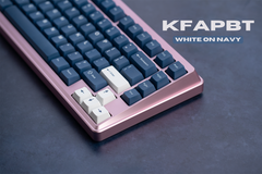 Close up of kfaPBT White on Navy Keycaps